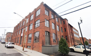 River District Lofts The Knitting Mill building 3-story brick warehouse apartment building