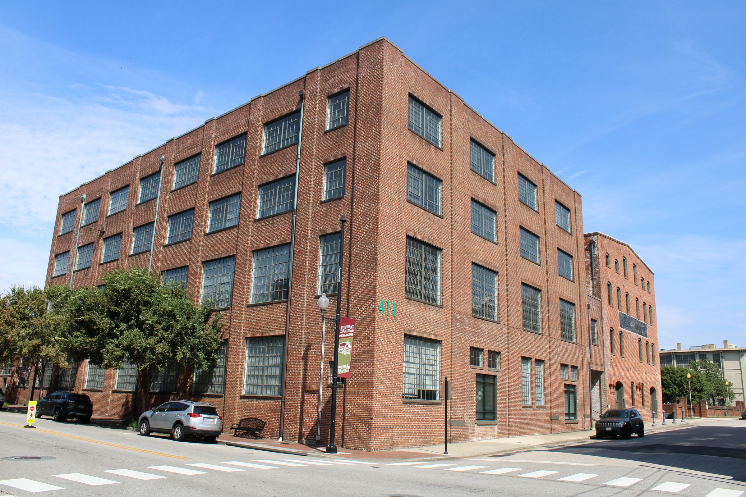 River District Lofts Richmond Cedar Works 4-story brick warehouse apartment building